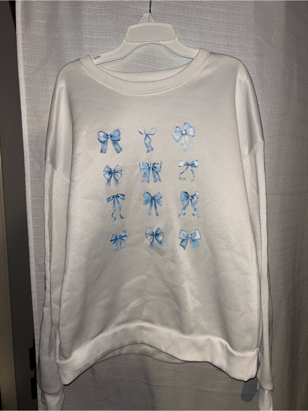 Girls' White Sweatshirt with Blue Bow Graphic